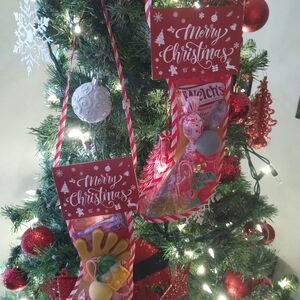 2 Festive Red Christmas Stocking filled with Christmas assortment